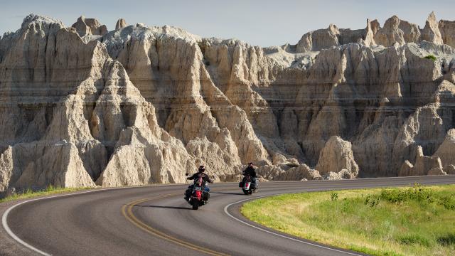 Bikers on curved road